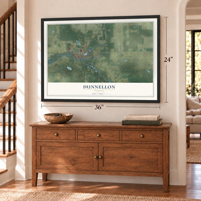 Dunnellon, Florida map, 24 x 36 inch print in a black frame above a dresser by a staircase