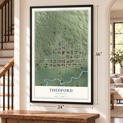 Thedford, Nebraska map, 24 x 36 inch print in a black frame by a staircase