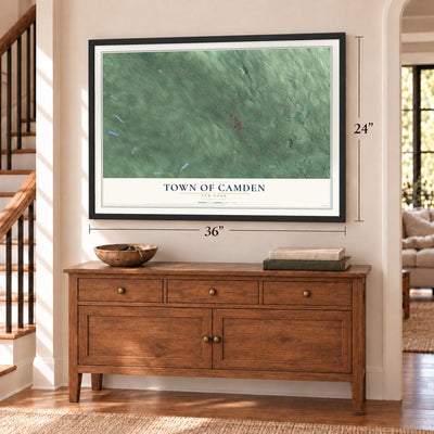 Town of Camden, New York map, 24 x 36 inch print in a black frame above a dresser by a staircase