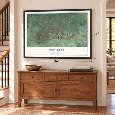 Bartlett, Tennessee map, 24 x 36 inch print in a black frame above a dresser by a staircase
