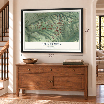 Del Mar Mesa, California map, 24 x 36 inch print in a black frame above a dresser by a staircase