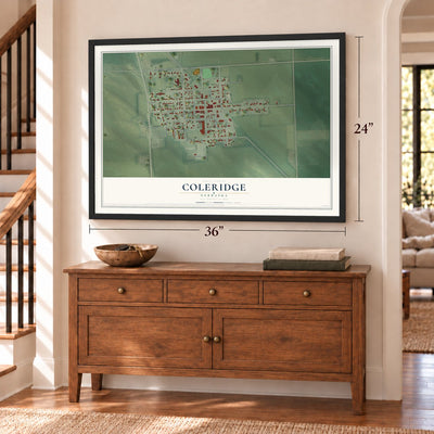 Coleridge, Nebraska map, 24 x 36 inch print in a black frame above a dresser by a staircase