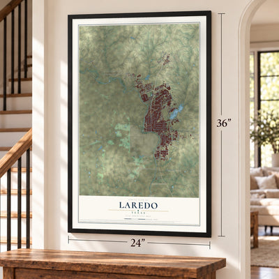 Laredo, Texas map, 24 x 36 inch print in a black frame by a staircase