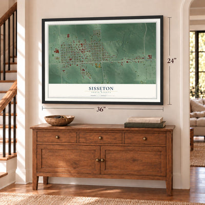 Sisseton, South Dakota map, 24 x 36 inch print in a black frame above a dresser by a staircase