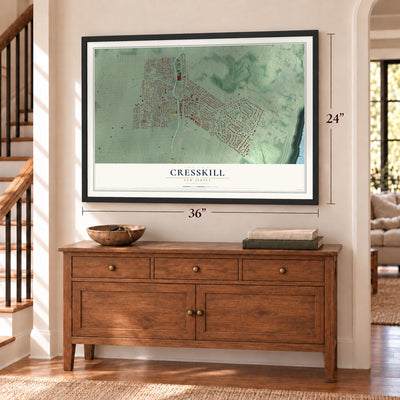 Cresskill, New Jersey map, 24 x 36 inch print in a black frame above a dresser by a staircase