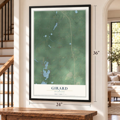 Girard, Michigan map, 24 x 36 inch print in a black frame by a staircase