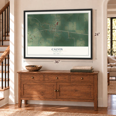 Calvin, Louisiana map, 24 x 36 inch print in a black frame above a dresser by a staircase
