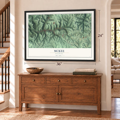 McKee, Kentucky map, 24 x 36 inch print in a black frame above a dresser by a staircase