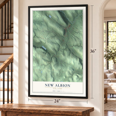 New Albion, New York map, 24 x 36 inch print in a black frame by a staircase