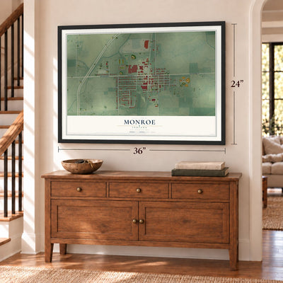 Monroe, Indiana map, 24 x 36 inch print in a black frame above a dresser by a staircase