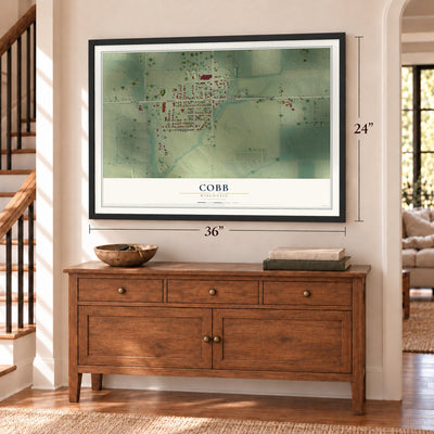 Cobb, Wisconsin map, 24 x 36 inch print in a black frame above a dresser by a staircase