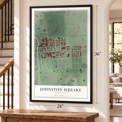 Johnston Square, Maryland map, 24 x 36 inch print in a black frame by a staircase
