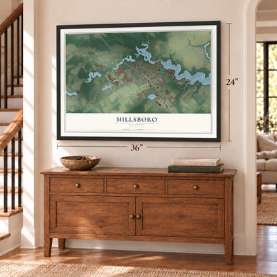 Millsboro, Delaware map, 24 x 36 inch print in a black frame above a dresser by a staircase