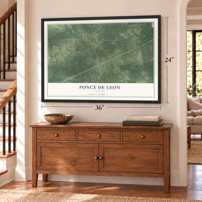Ponce de Leon, Florida map, 24 x 36 inch print in a black frame above a dresser by a staircase