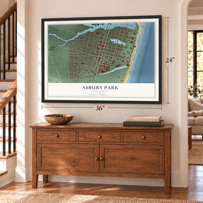 Asbury Park, New Jersey map, 24 x 36 inch print in a black frame above a dresser by a staircase