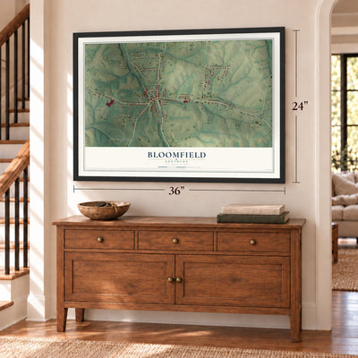 Bloomfield, Kentucky map, 24 x 36 inch print in a black frame above a dresser by a staircase