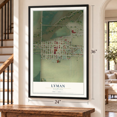 Lyman, Nebraska map, 24 x 36 inch print in a black frame by a staircase