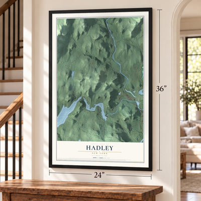 Hadley, New York map, 24 x 36 inch print in a black frame by a staircase