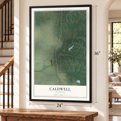 Caldwell, Arkansas map, 24 x 36 inch print in a black frame by a staircase