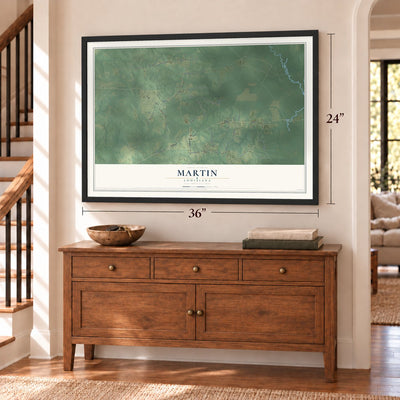 Martin, Louisiana map, 24 x 36 inch print in a black frame above a dresser by a staircase