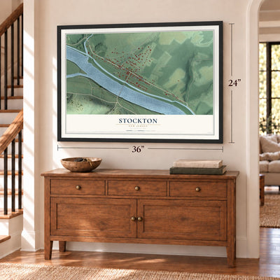 Stockton, New Jersey map, 24 x 36 inch print in a black frame above a dresser by a staircase