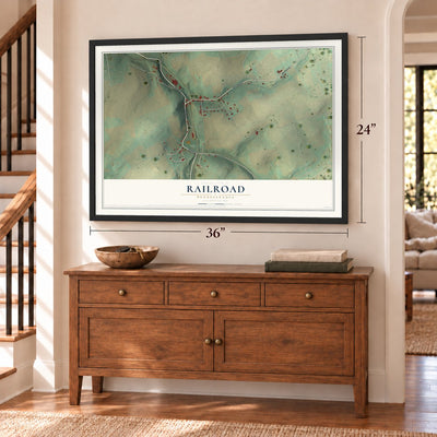 Railroad, Pennsylvania map, 24 x 36 inch print in a black frame above a dresser by a staircase