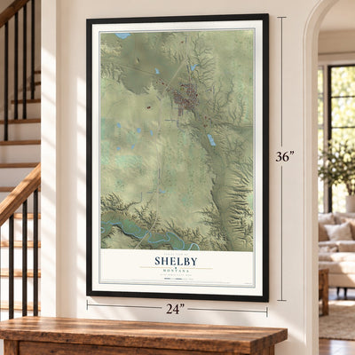 Shelby, Montana map, 24 x 36 inch print in a black frame by a staircase