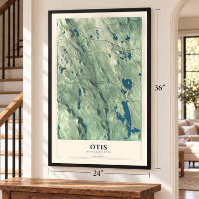 Otis, Massachusetts map, 24 x 36 inch print in a black frame by a staircase