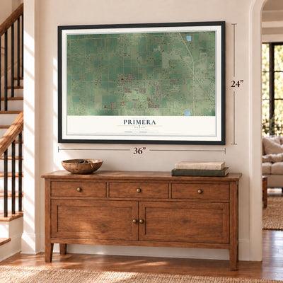 Primera, Texas map, 24 x 36 inch print in a black frame above a dresser by a staircase
