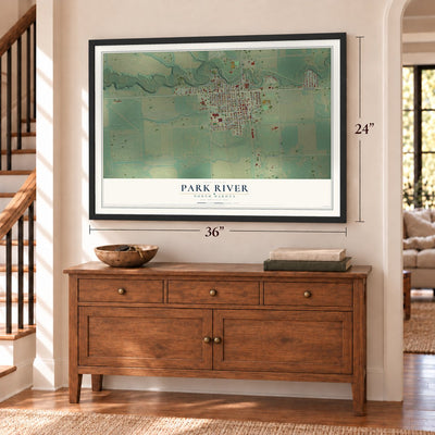 Park River, North Dakota map, 24 x 36 inch print in a black frame above a dresser by a staircase