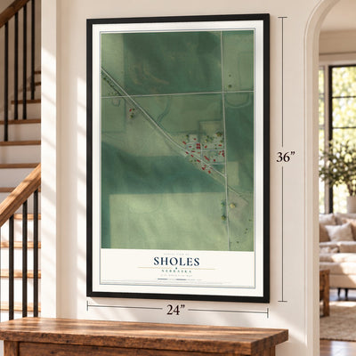 Sholes, Nebraska map, 24 x 36 inch print in a black frame by a staircase