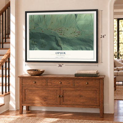 Ophir, Colorado map, 24 x 36 inch print in a black frame above a dresser by a staircase