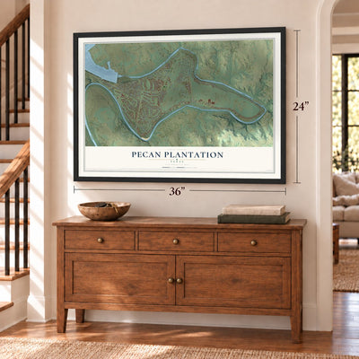 Pecan Plantation, Texas map, 24 x 36 inch print in a black frame above a dresser by a staircase