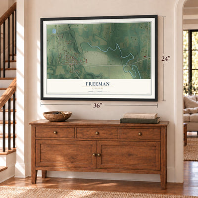 Freeman, Missouri map, 24 x 36 inch print in a black frame above a dresser by a staircase