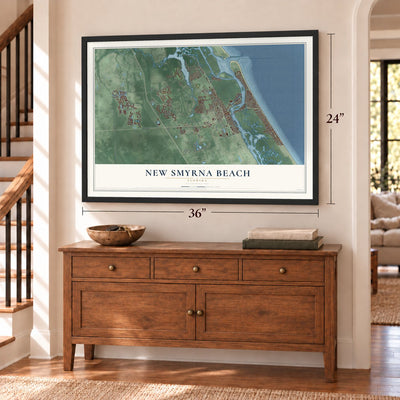 New Smyrna Beach, Florida map, 24 x 36 inch print in a black frame above a dresser by a staircase