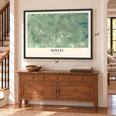 Rowley, Massachusetts map, 24 x 36 inch print in a black frame above a dresser by a staircase