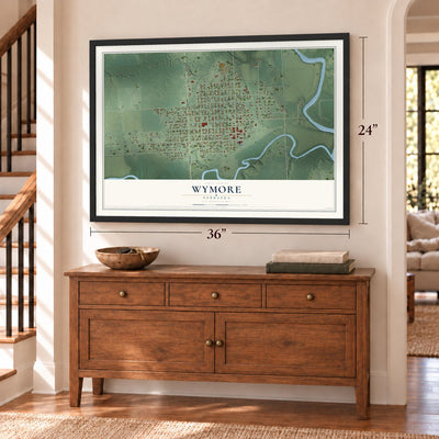 Wymore, Nebraska map, 24 x 36 inch print in a black frame above a dresser by a staircase