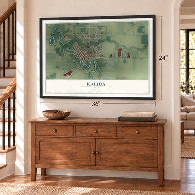 Kalida, Ohio map, 24 x 36 inch print in a black frame above a dresser by a staircase