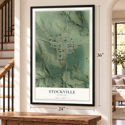 Stockville, Nebraska map, 24 x 36 inch print in a black frame by a staircase