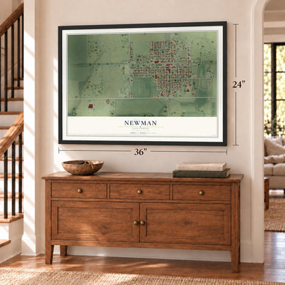 Newman, Illinois map, 24 x 36 inch print in a black frame above a dresser by a staircase