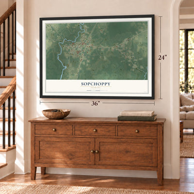 Sopchoppy, Florida map, 24 x 36 inch print in a black frame above a dresser by a staircase