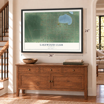 Lakewood Club, Michigan map, 24 x 36 inch print in a black frame above a dresser by a staircase