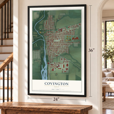 Covington, Ohio map, 24 x 36 inch print in a black frame by a staircase