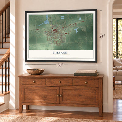 Milbank, South Dakota map, 24 x 36 inch print in a black frame above a dresser by a staircase