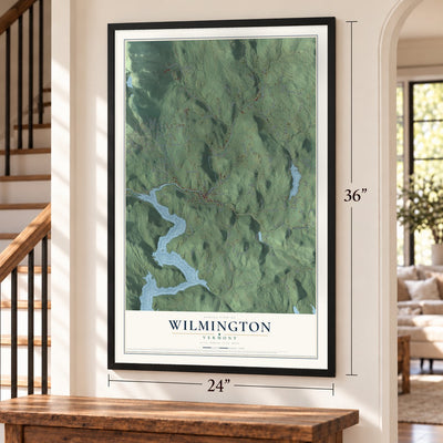 Wilmington, Vermont map, 24 x 36 inch print in a black frame by a staircase
