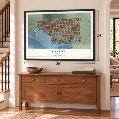 Canton, Maryland map, 24 x 36 inch print in a black frame above a dresser by a staircase