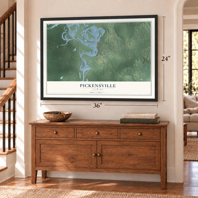 Pickensville, Alabama map, 24 x 36 inch print in a black frame above a dresser by a staircase