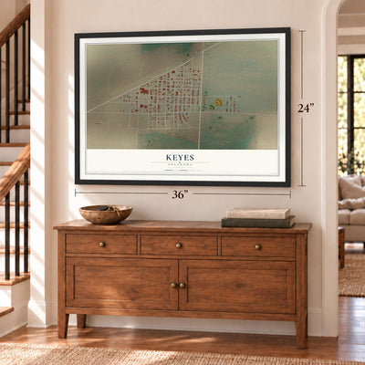 Keyes, Oklahoma map, 24 x 36 inch print in a black frame above a dresser by a staircase