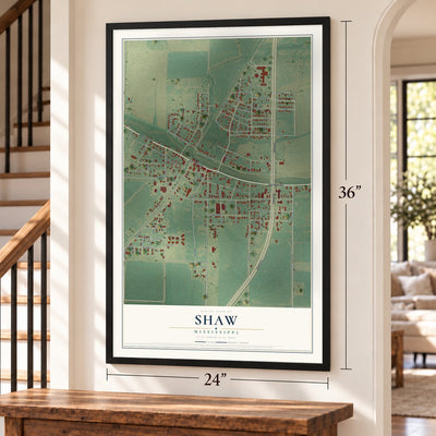 Shaw, Mississippi map, 24 x 36 inch print in a black frame by a staircase