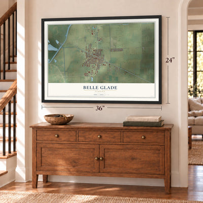 Belle Glade, Florida map, 24 x 36 inch print in a black frame above a dresser by a staircase
